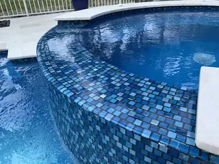 Glass pool tile selection or installation for a South Florida swimming pool — project 13