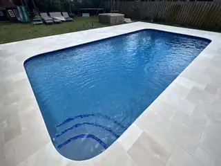 Pool resurfacing project with a blue swimming pool finish — project 06