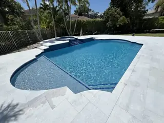 Pool resurfacing project with a blue swimming pool finish — project 07