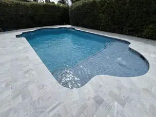 Pool resurfacing project with a blue swimming pool finish — project 08