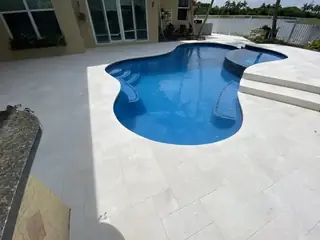 Pool resurfacing project with a blue swimming pool finish — project 10