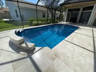 Pool resurfacing project with a blue swimming pool finish — project 11