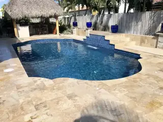 Pool resurfacing project with a blue swimming pool finish — project 12