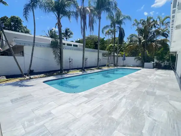 Natural stone pool deck installation, project 17